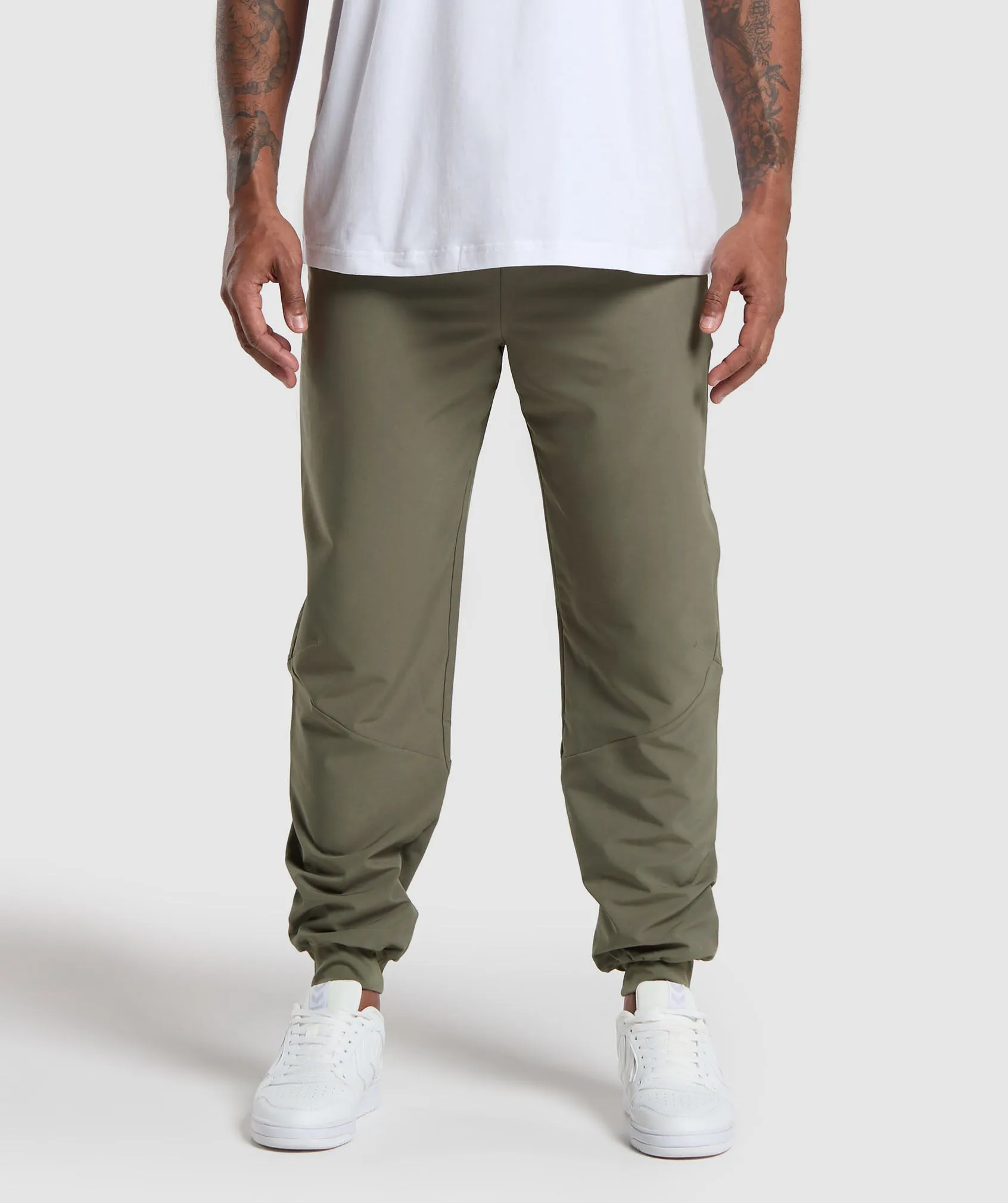 Gymshark Ease Woven Joggers - Base Green